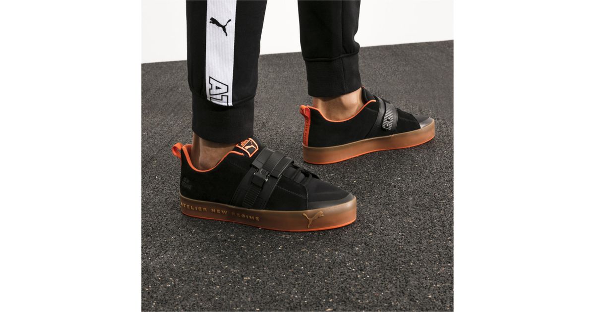 blue puma race boots