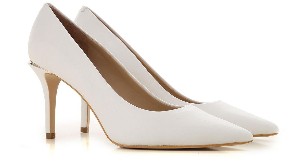 guess white high heels