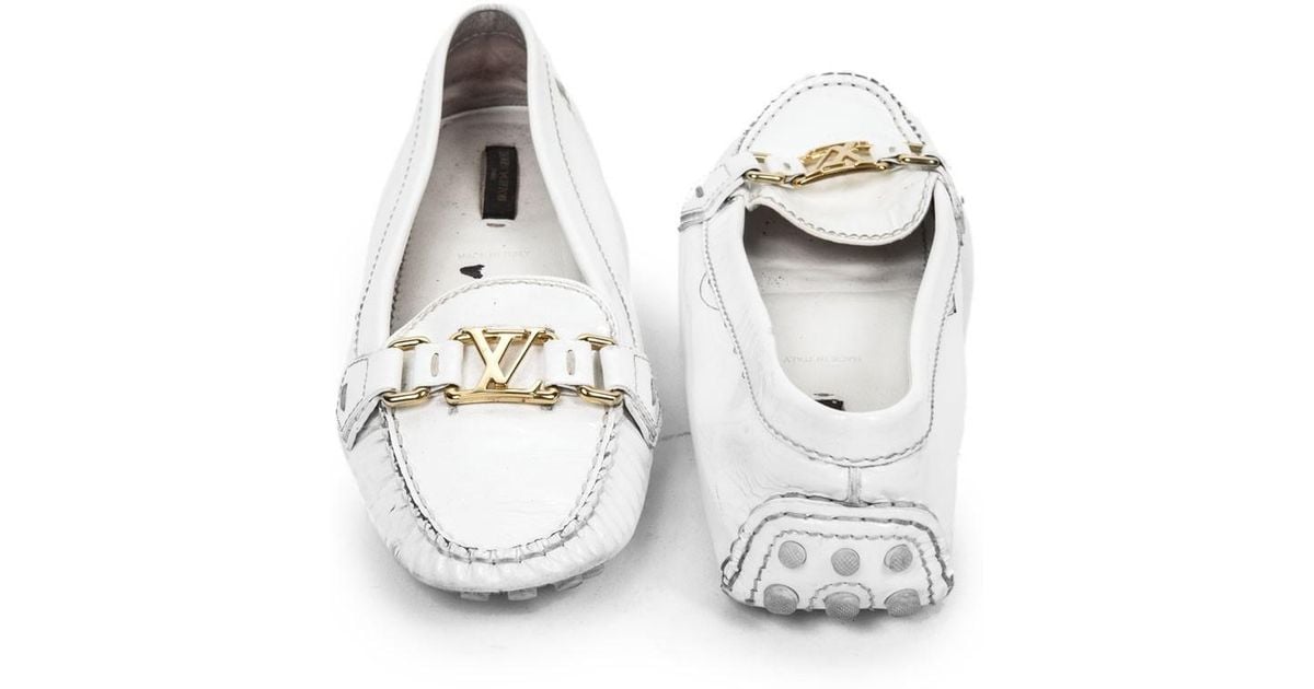 white patent leather loafers