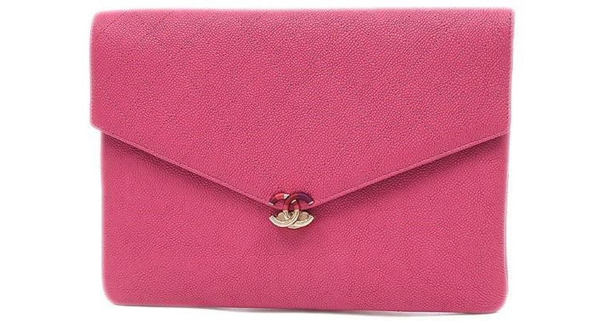 dark pink clutch bag