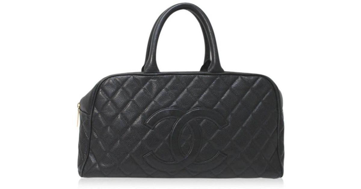 chanel duffle bag black and white