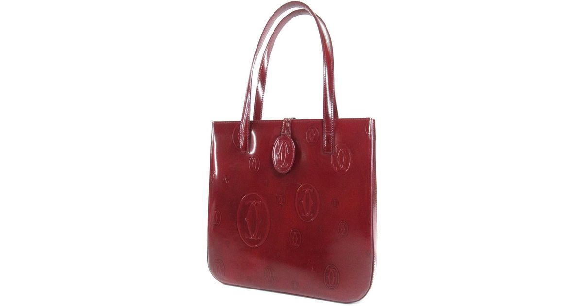red patent leather pocketbook
