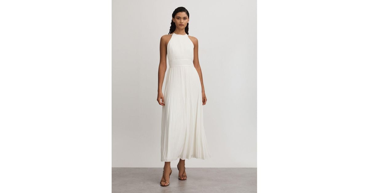 Margot Strappy Halter Neck Ruffle Trim Asymmetric Hem Pleated Maxi Dress