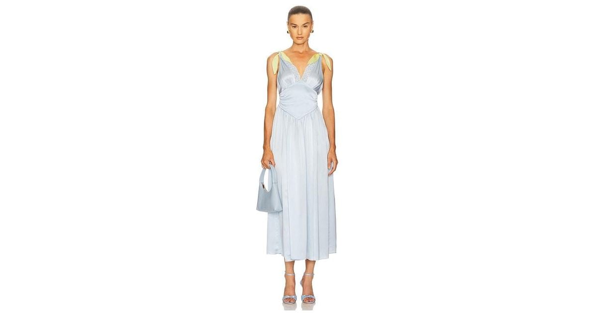 helsa blue silk dress The Sabine Dress in Hydrangea blue with it's voluminous silk chiffon cape that drapes from the bottom of the dress over the shoulders and moves like air