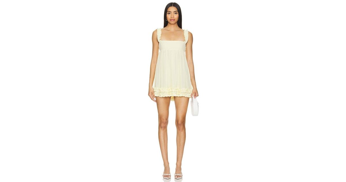 revolve chandra mini dress When they say the dress code is butter yellow  @emmaleger in the  @majorelle_collection Chandra Mini Dress  Shop her look now at the link in  bio
