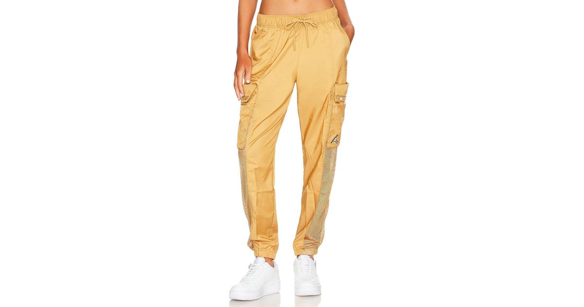 Nike Essential Utility Pant in Yellow Lyst