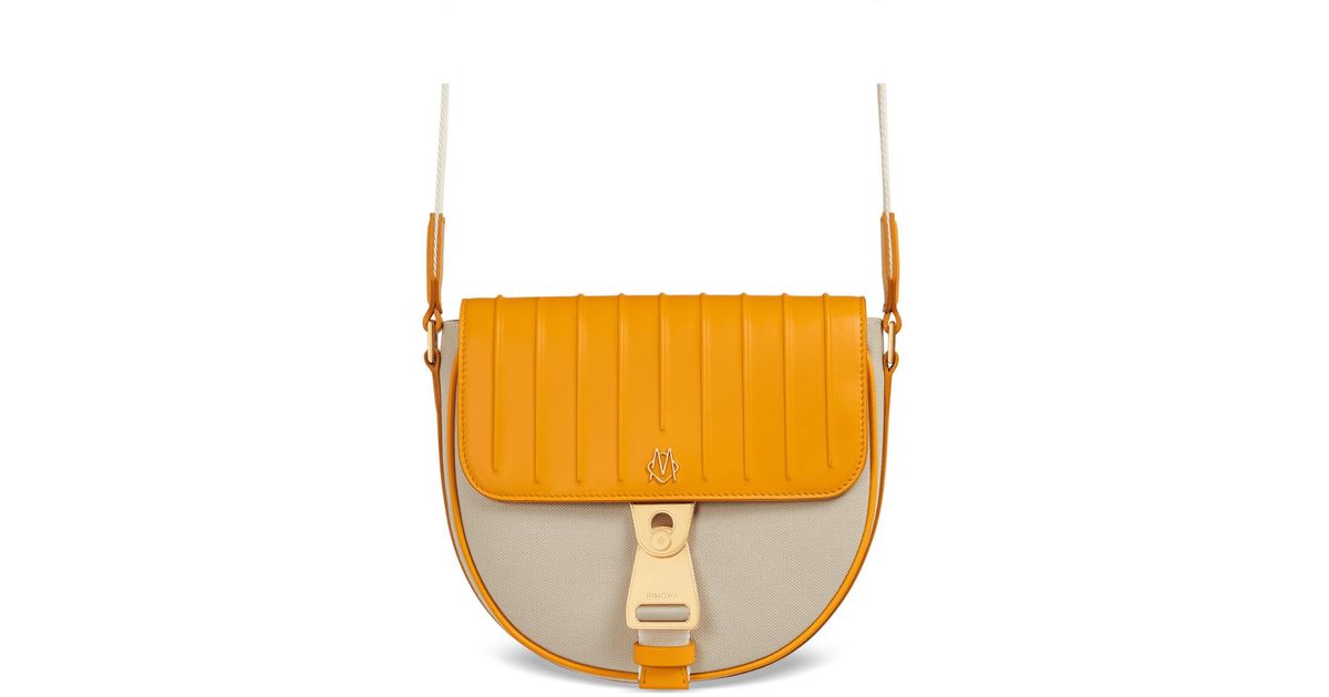 rimowa never still crossbody flap bag