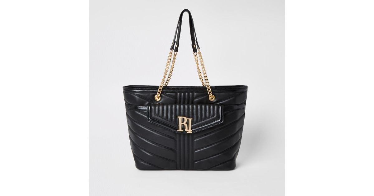 River island black deals pocket front slouch bag