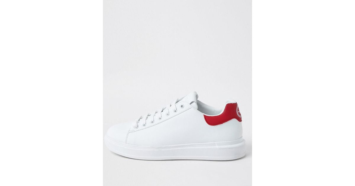 White trainers with red back sale