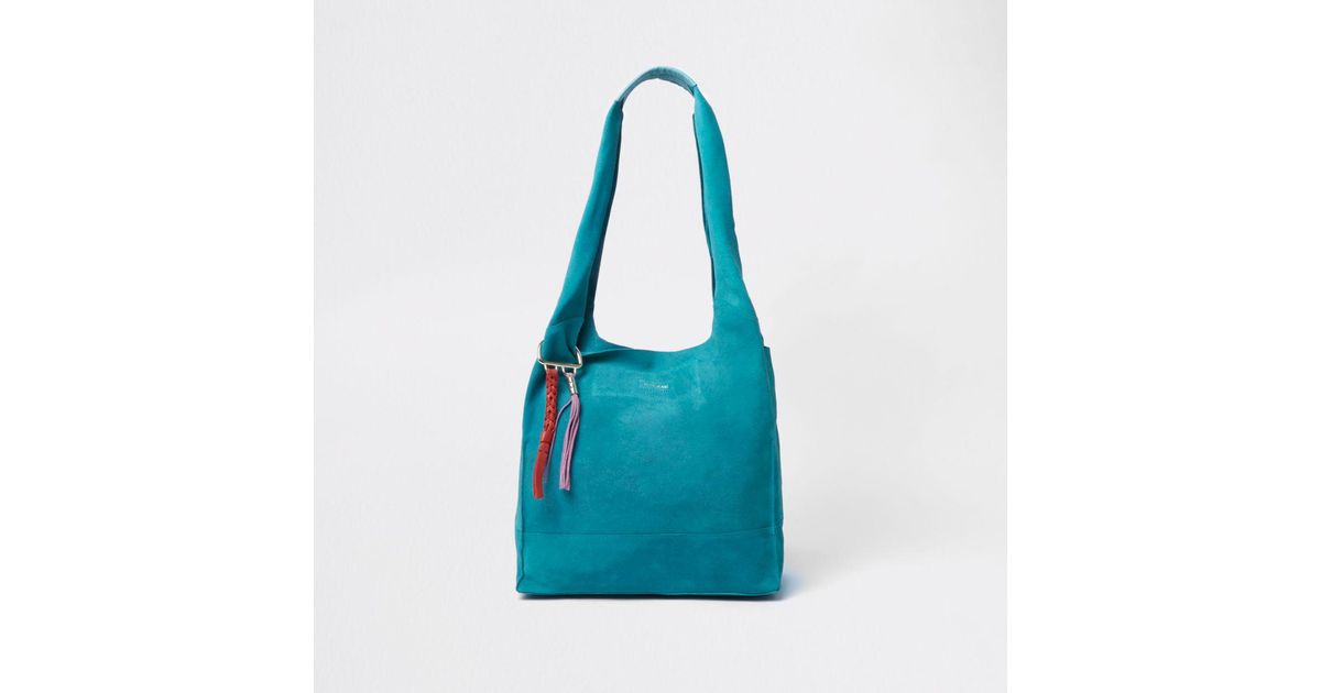 teal blue handbags