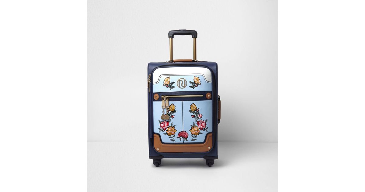blue floral suitcase
