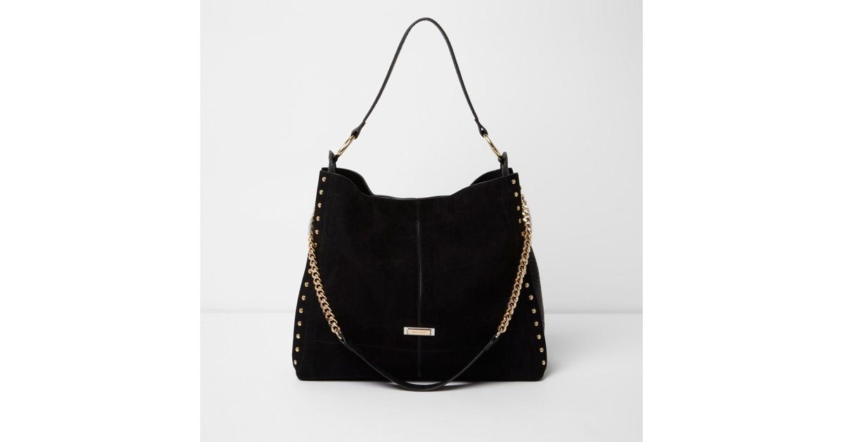 River island black studded sales oversized slouch chain bag