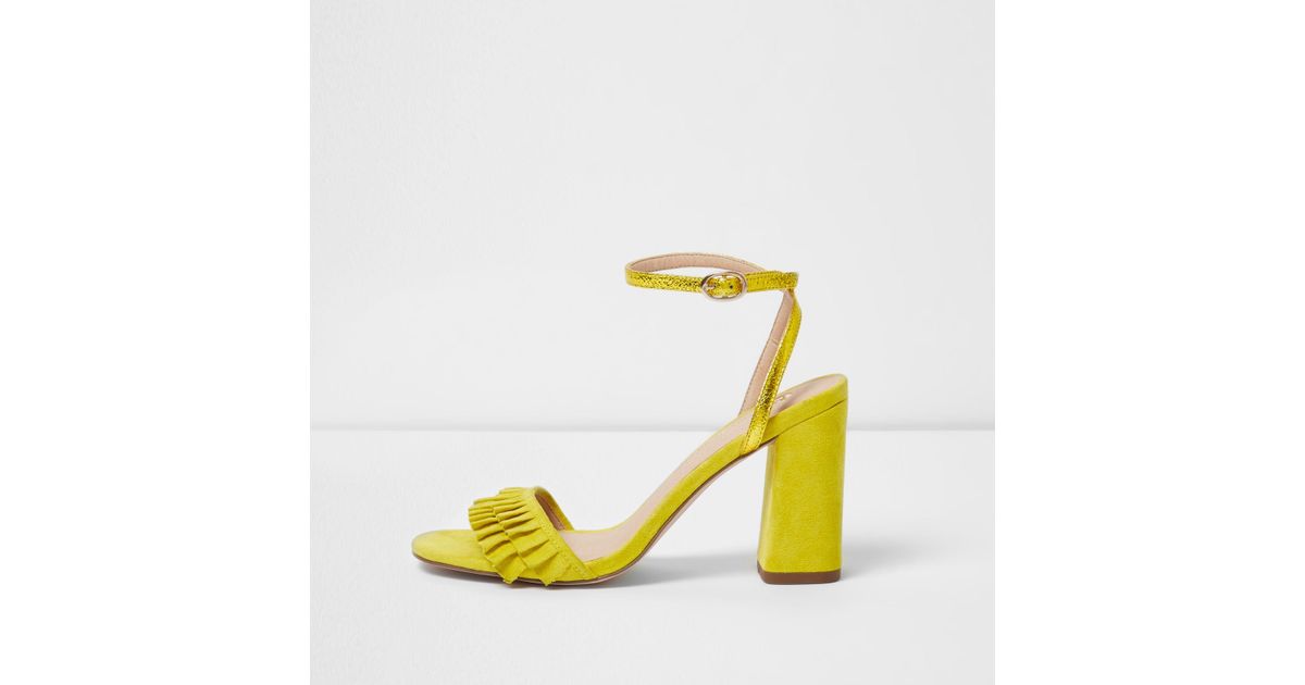 yellow frill heels