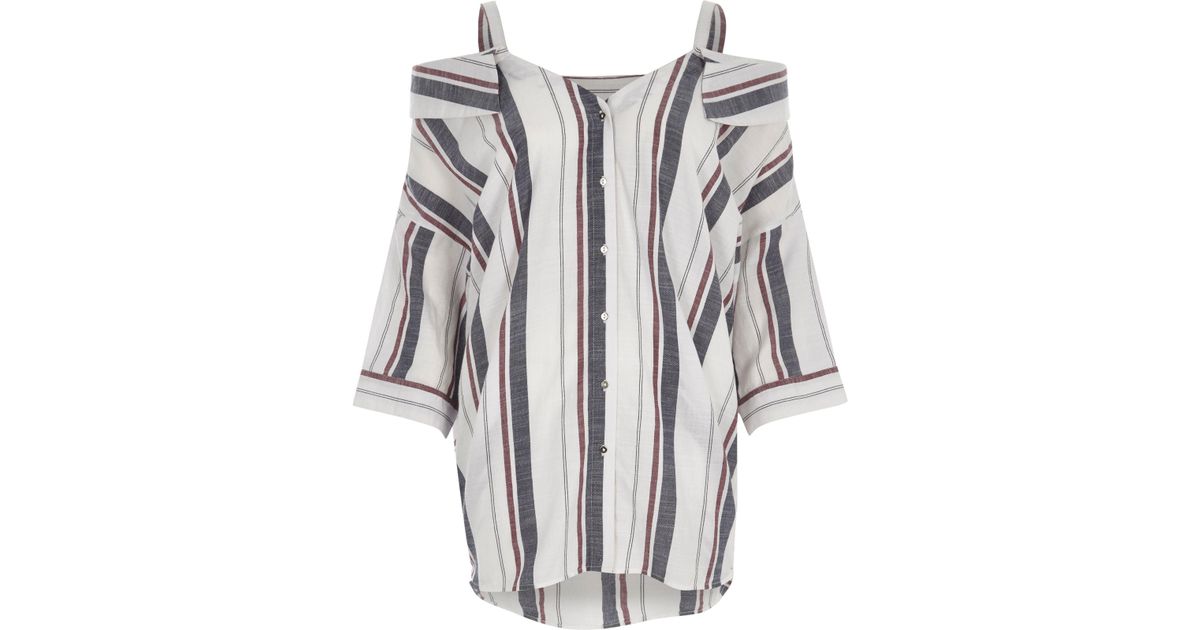 black and white striped cold shoulder top