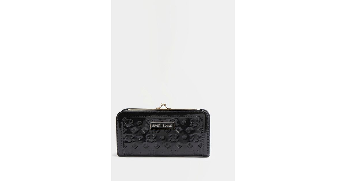 black patent ri embossed purse