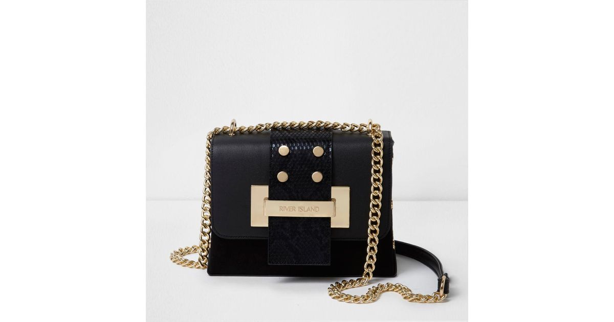 black and gold river island bag