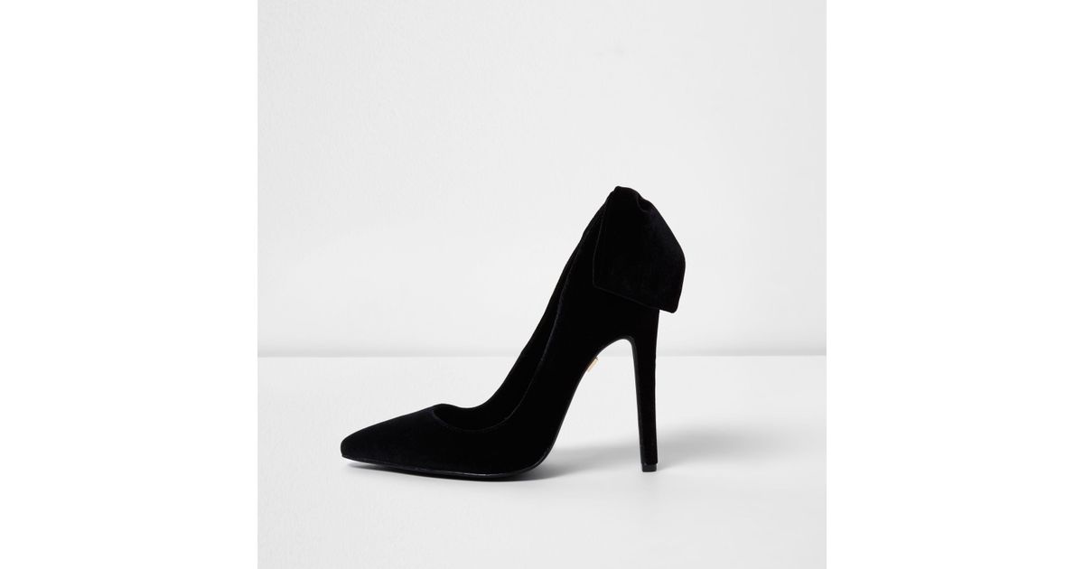 black velvet heels with bows