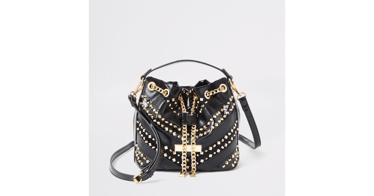 studded duffle bag