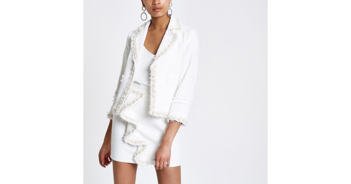white boucle jacket