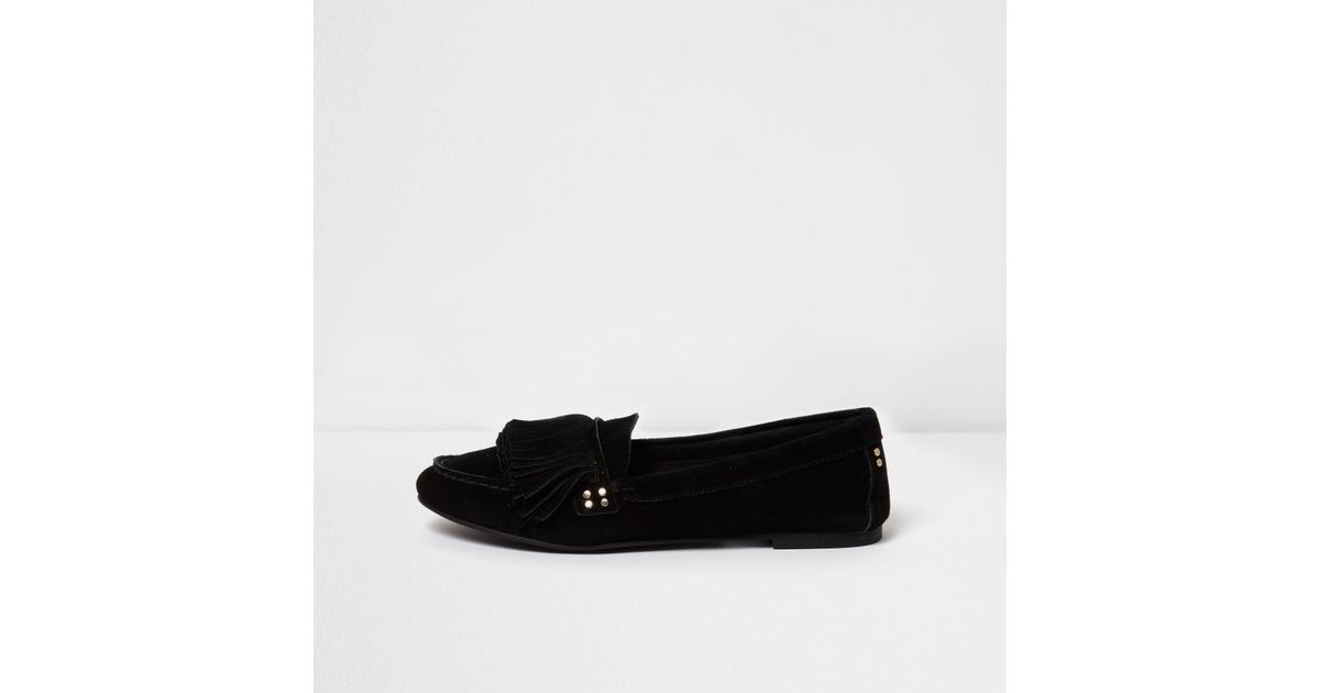 black fringe moccasins