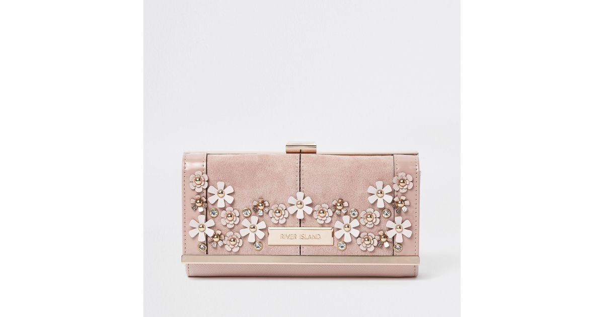 flower embellished bag
