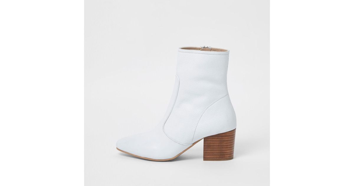white leather block heel ankle boots