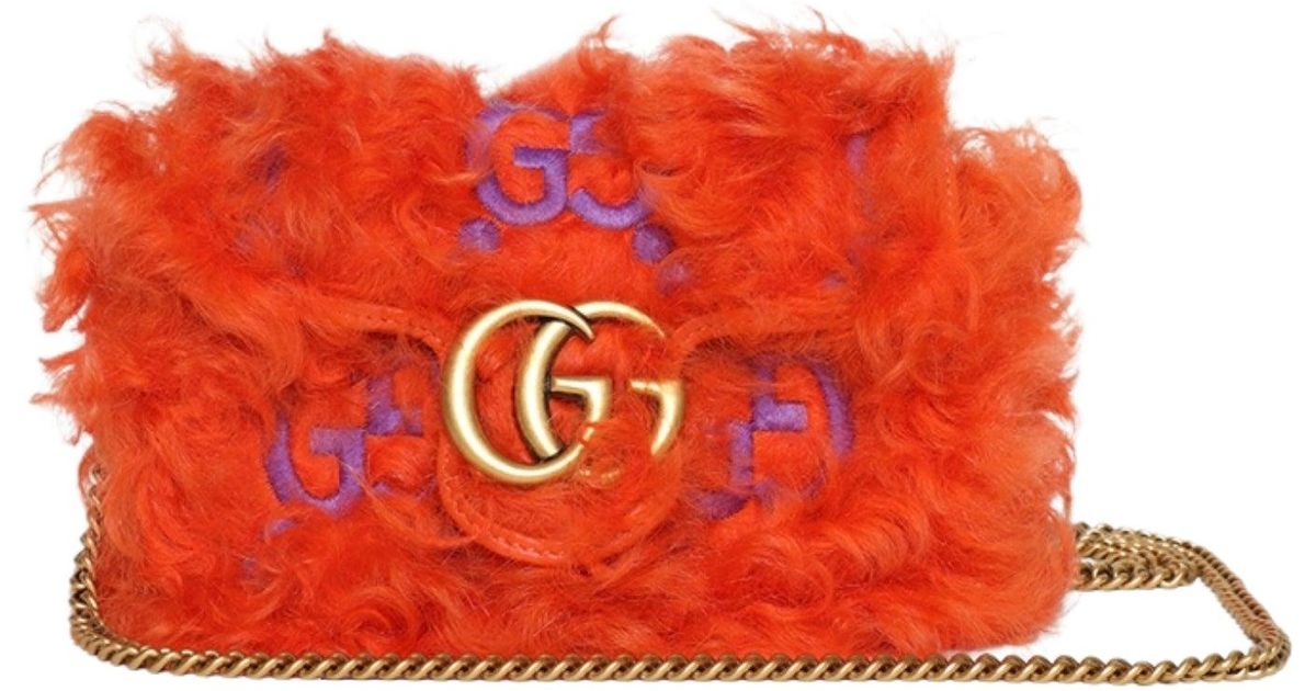 ショルダーバッグ・ポシェット Marmont Super Mini Shearling Bag in Orange Gucci Marmont Super Mini Shearling Bag In Orange in Red | Lyst