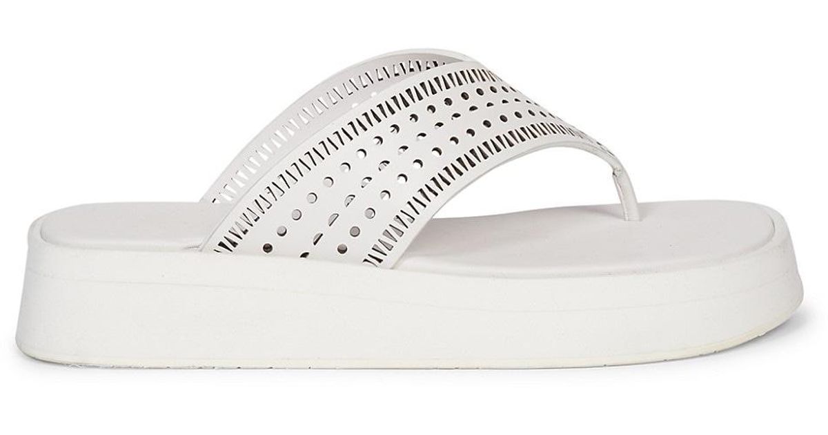 AlaÃ¯a Perforated Leather Platform Thong Sandals in White - Lyst