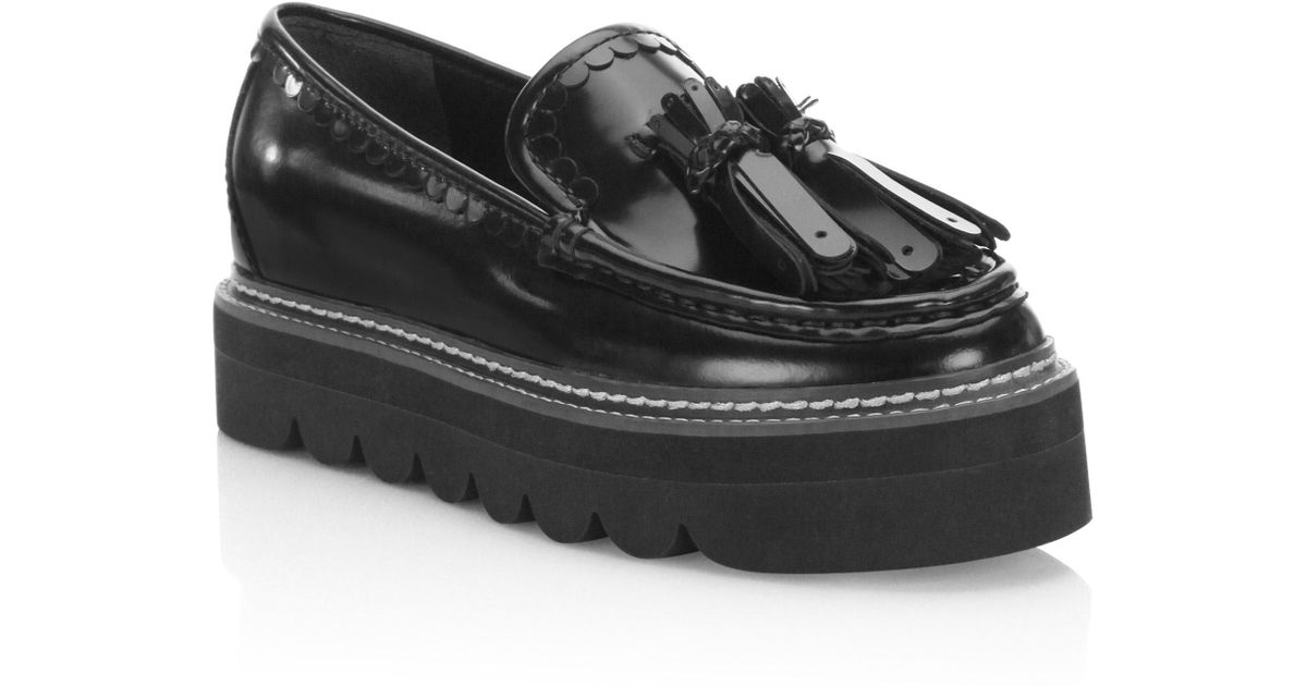 black platform loafers