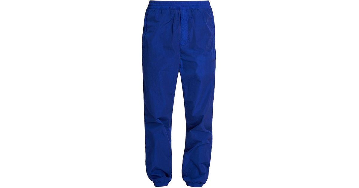 Givenchy Synthetic Garment-dyed 4g Track Pants in Blue for Men | Lyst