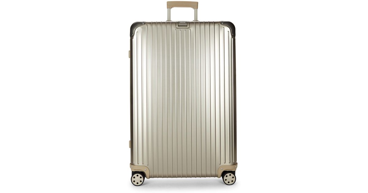 rimowa gold luggage