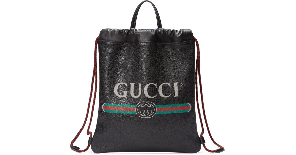 gucci print leather drawstring backpack