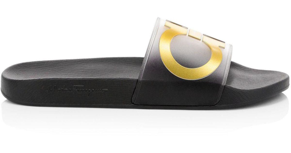 black and gold ferragamo slides