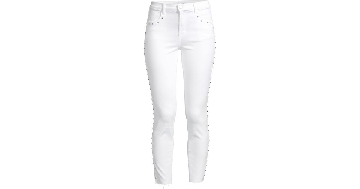 white studded jeans