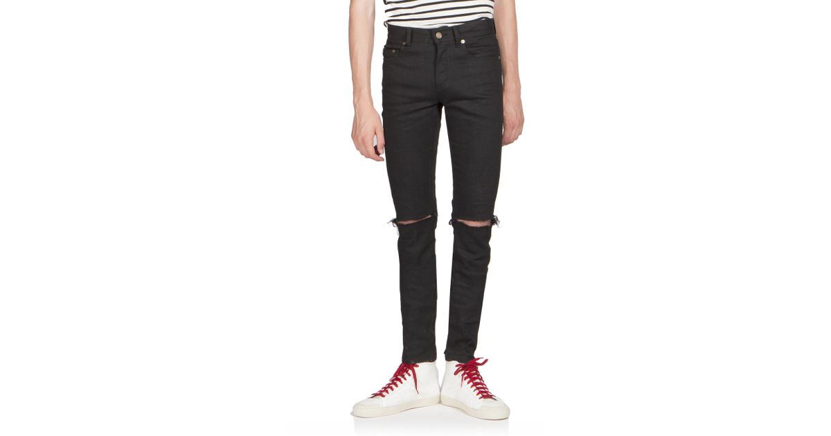 saint laurent ripped knee jeans