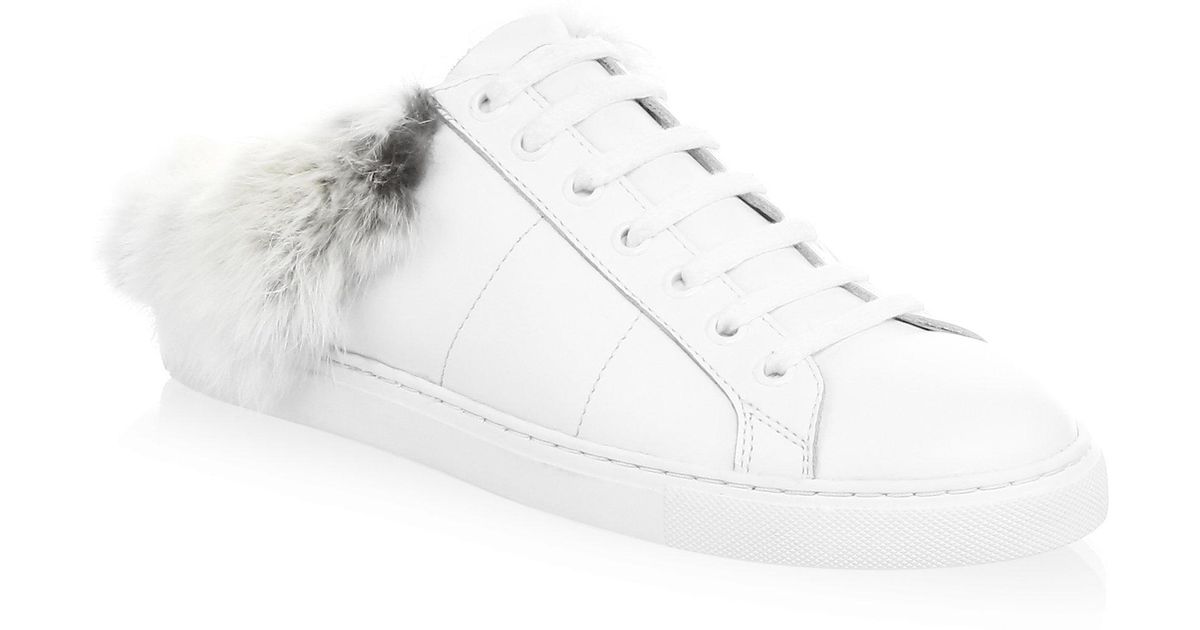 white sneakers with fur