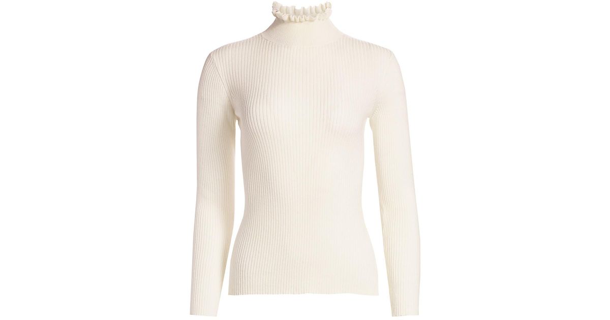 white ruffle turtleneck
