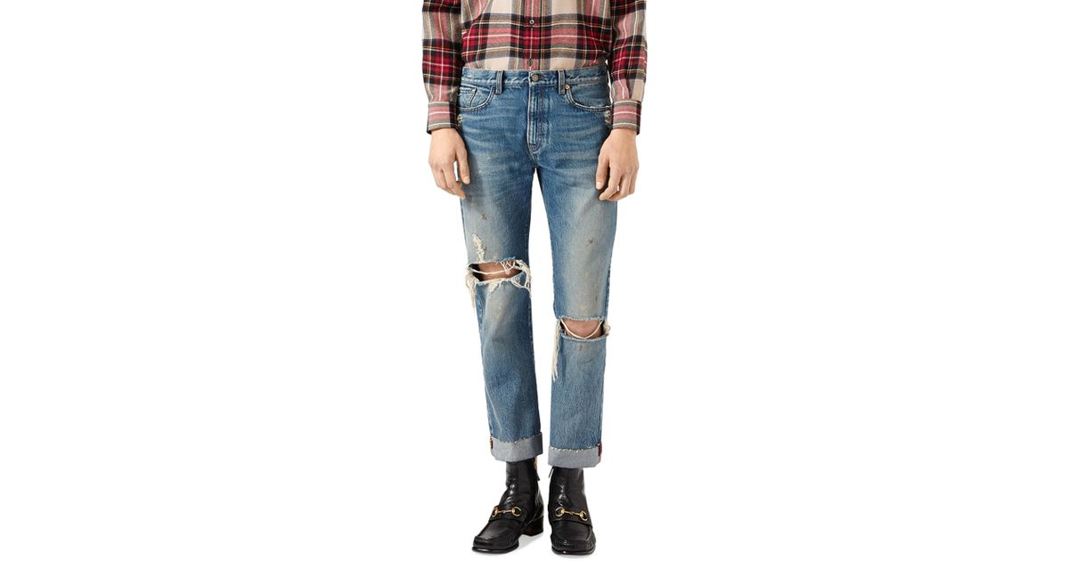 gucci distressed jeans