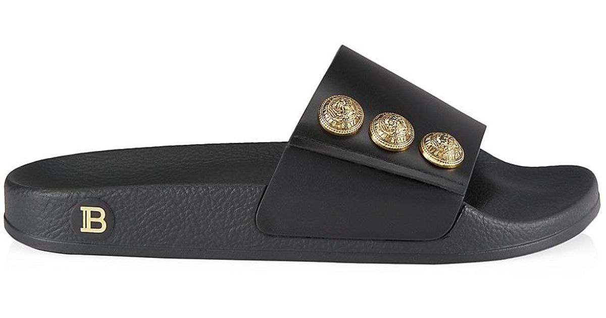Balmain Symi Leather Button Slides in Black | Lyst