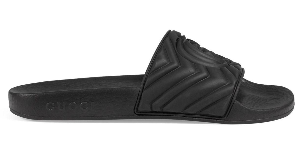 Gucci Matelassé Rubber Slides in Black Lyst