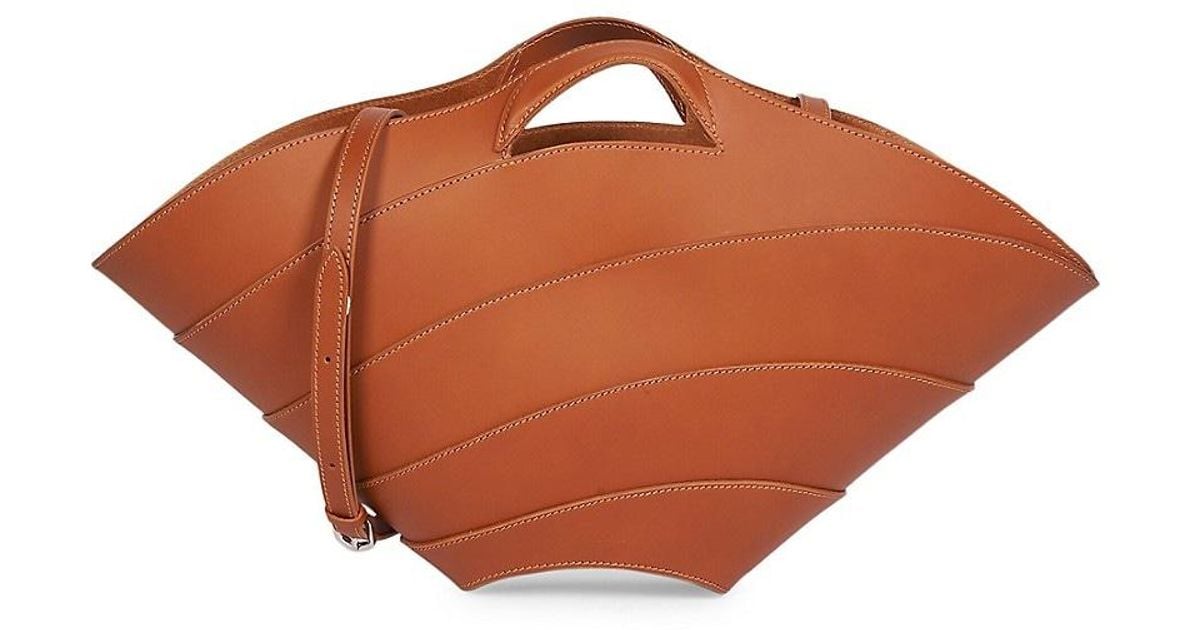 【ALAIA】Khaima ミディアム レザー トートバッグ ブラウン Khaima Medium leather tote bag in brown - Alaia | Mytheresa
