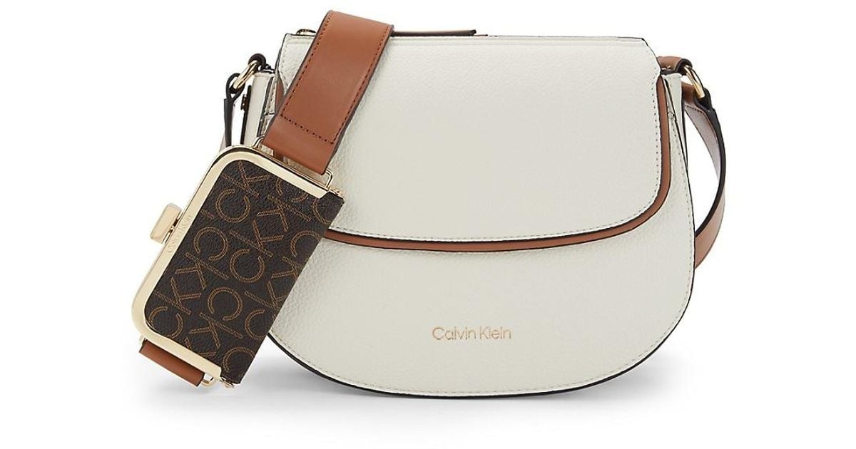 Calvin Klein Logo Saddle Crossbody Bag in White