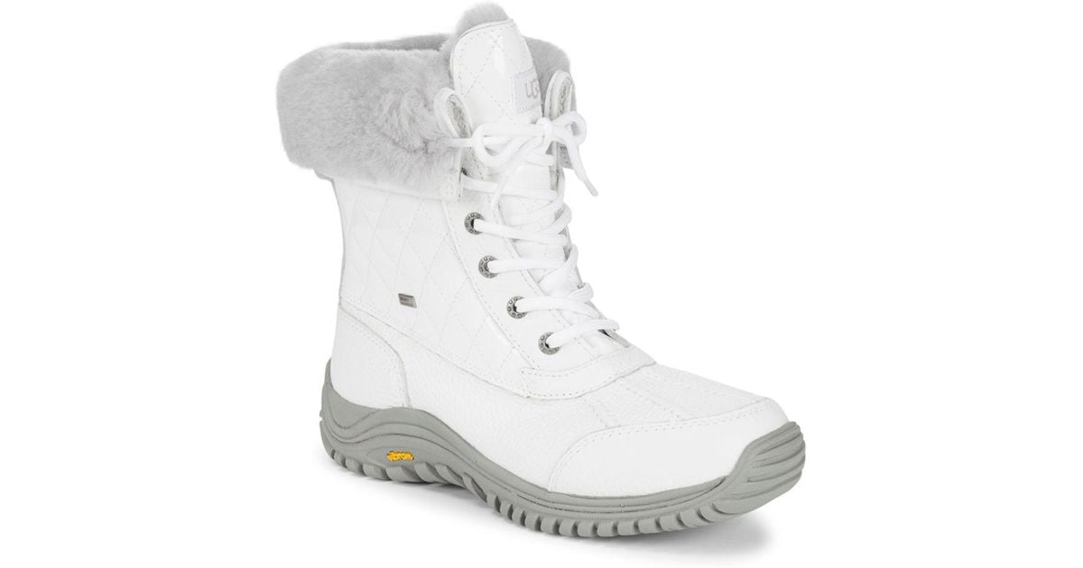 white snow boots with fur