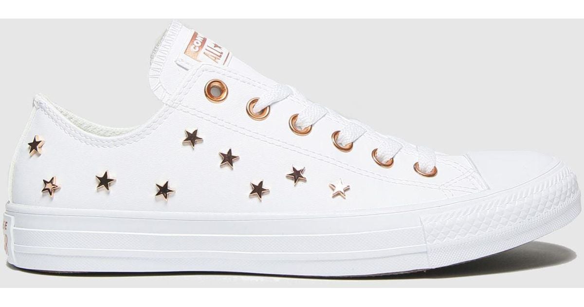 White converse hotsell with gold stars