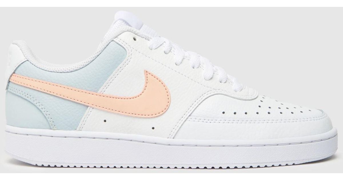 white and pink court vision trainers