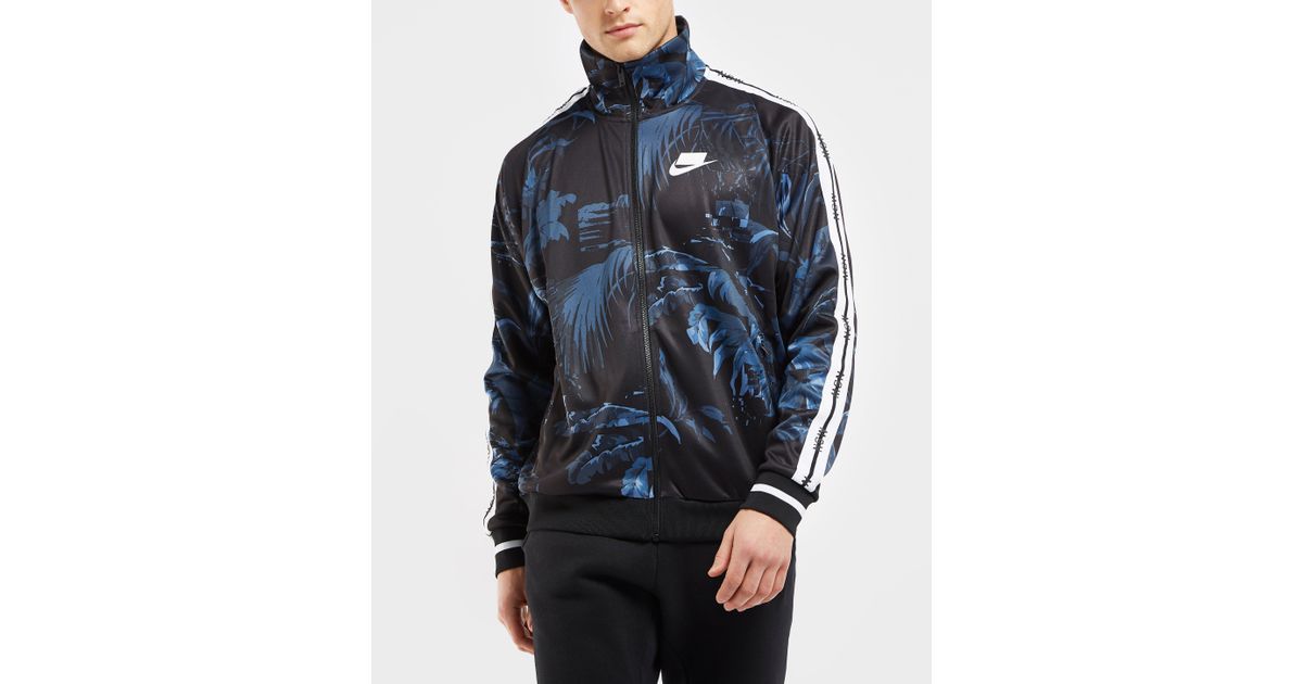 nike sportswear all over print track top