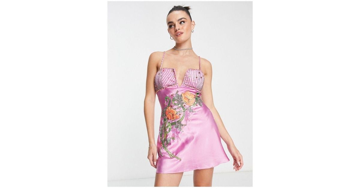 asos design bias cut midi satin dress with floral embellishment ASOS DESIGN bias cut midi slip dress in satin with contrast floral embroidery