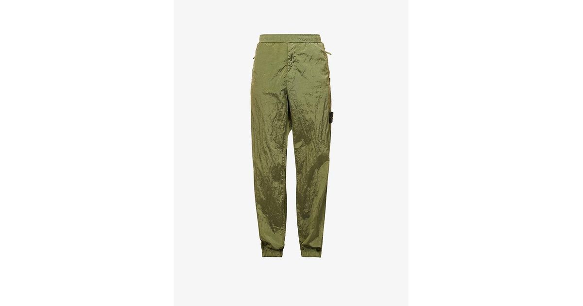 Stone Island Brandbadge Taperedleg Relaxedfit Shell jogging Bottoms in Green for Men Lyst