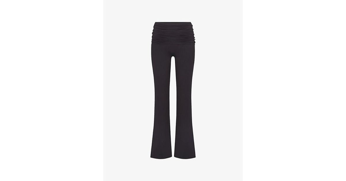 NikeSKIMS Matte Fold-Over Slim Flare Leggings in Blue | Lyst UK