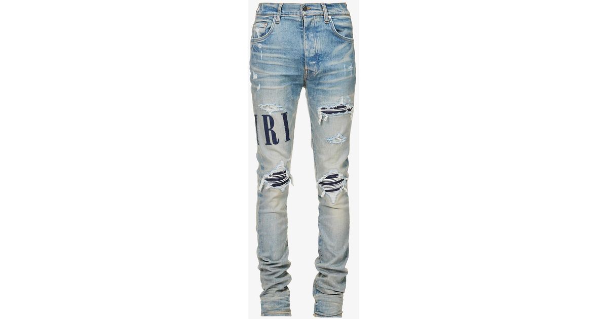Amiri Brandappliqué Slimfit Taperedleg Stretchcotton Blend Jeans in
